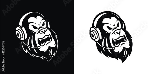 Black and white silhouette of a gorilla wearing earphones.