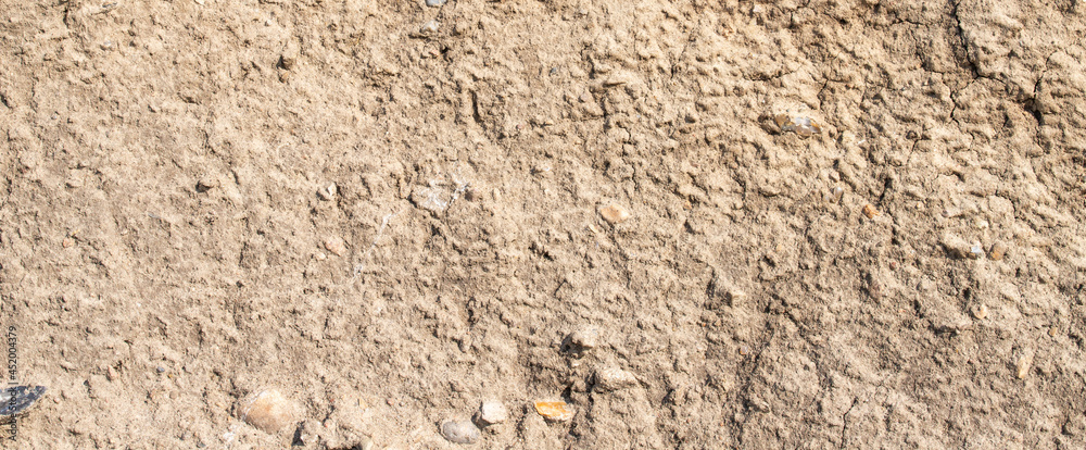 Fototapeta premium texture of clay ground surface background