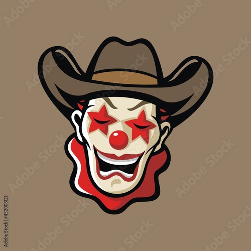 The clown head mascot wears a cowboy hat.