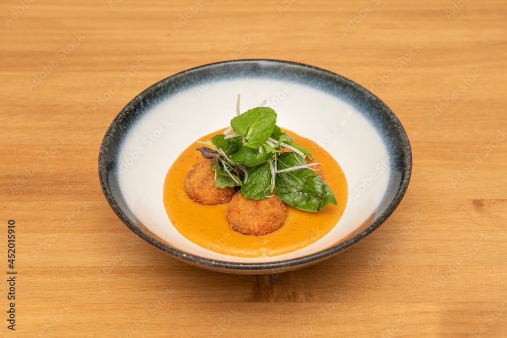 Spicy Red Curry Bowl with Peppermint, Spinach, Bean Sprouts and Breaded Pork Balls Spicy Red Curry Bowl with Peppermint, Spinach, Bean Sprouts and Breaded Pork Balls