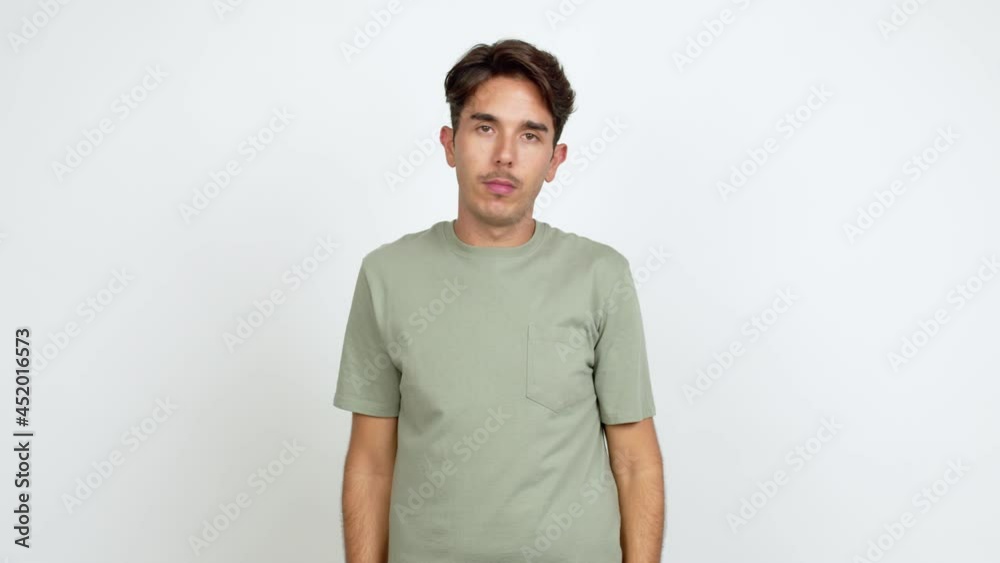 Young man doing time out gesture over isolated background Young man doing time out gesture over isolated background
