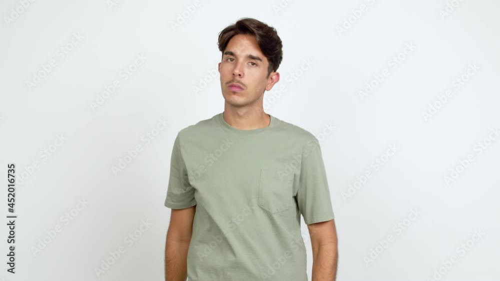 Young man doing stop sign over isolated background Young man doing stop sign over isolated background