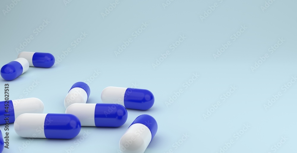 Blue and white pills on a light background with place for text. Biological supplements, vitamins, medicines for health. Horizontally.