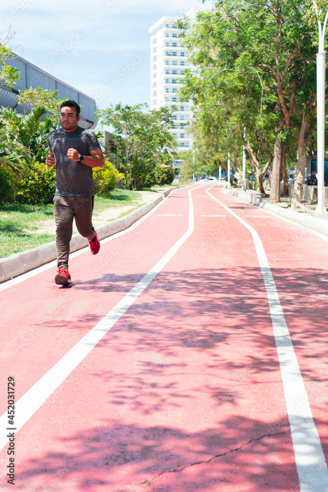 A man running outdoors in the city