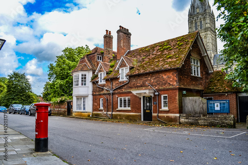 UK, Salisbury, 15.08.2021: The city center with its medieval architecture and modern shopping streets #452031799