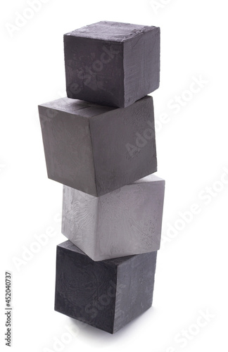 Concrete cube or cement brick isolated on white background. Construction block