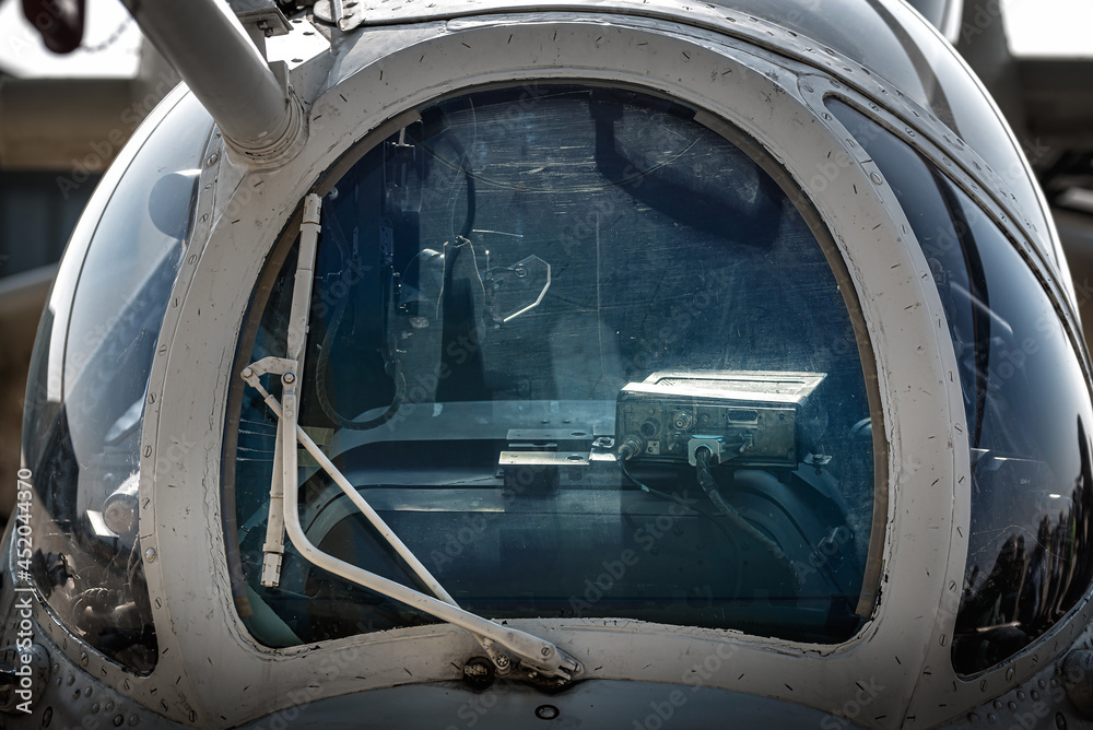 Front view close-up of military helicopter cockpit