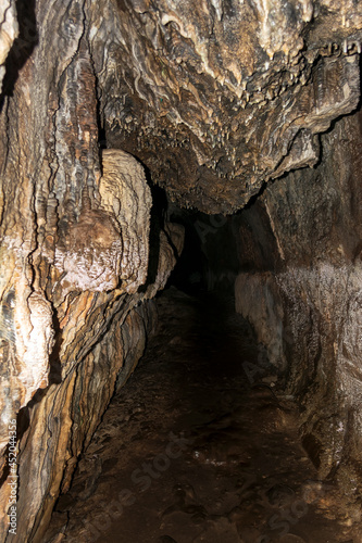 Cave stalactites and formations in Bat cave at Hymettus, Greece photo