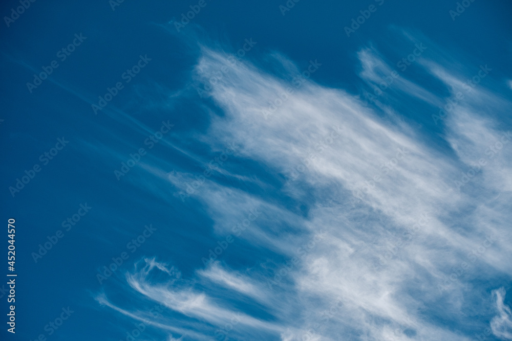 Streaky clouds against a blue sky Streaky clouds against a blue sky