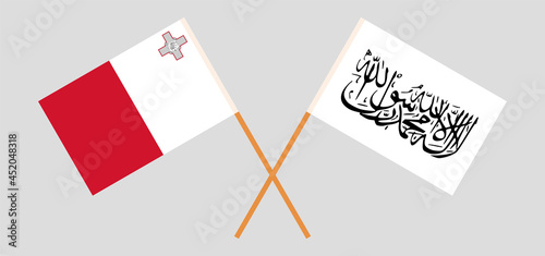 Crossed flags of Malta and Islamic Emirate of Afghanistan. Official colors. Correct proportion
