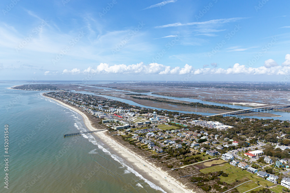 Aerial of Isle of Palms, SC. Coastline and pier oceanscape in South Carolina.