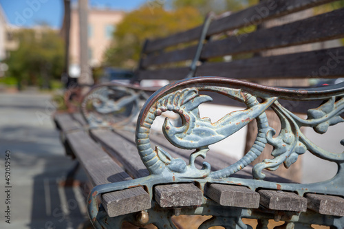 Ironwork on the armrest of a public bench in Downtown Charleston, SC.