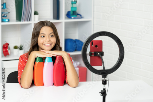 happy kid long curly hair making review of hair conditioner for blogging, childhood photo
