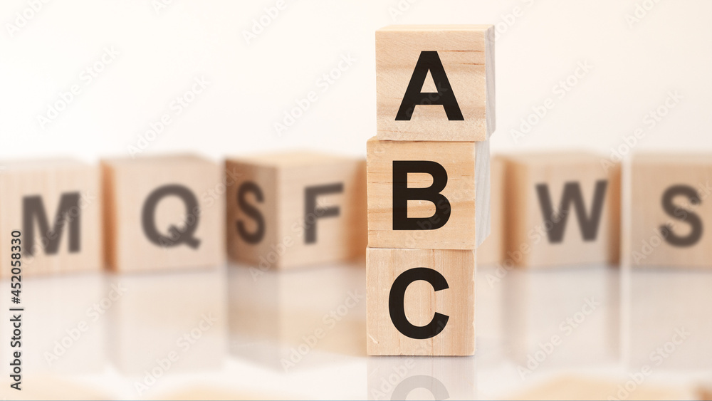 word ABC from wooden blocks with letters, concept.