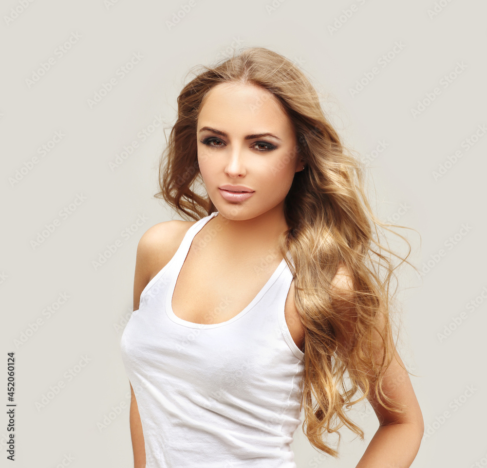 Beauty portrait of a young girl with windblown hair Beauty portrait of a young girl with windblown hair