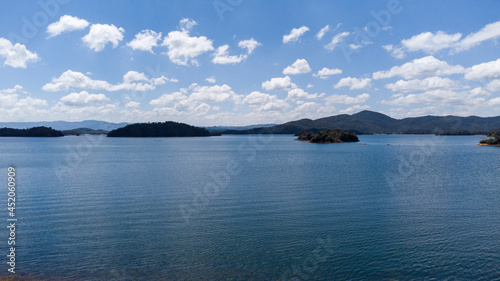Panoramic dam of the Pe  ol - Guatape in the department of Antioquia Colombia  day of blue and sunny nines