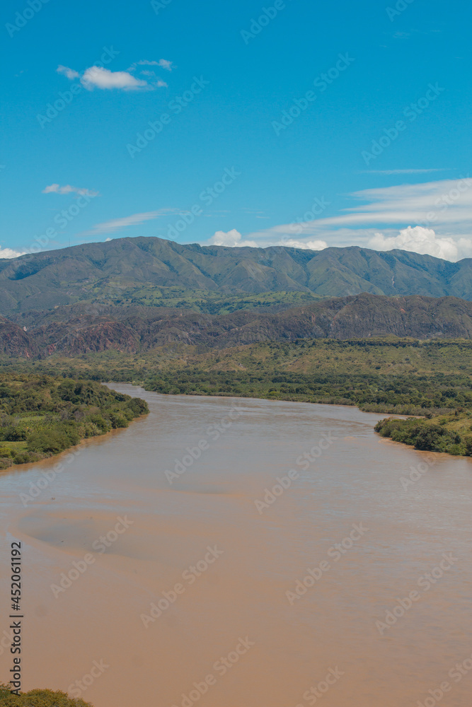 river in the mountains with blue sky river in the mountains with blue sky