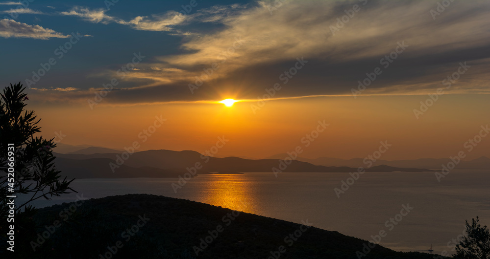 Beautiful sunset over Aegean Sea in Pelion Peninsula, Greece.