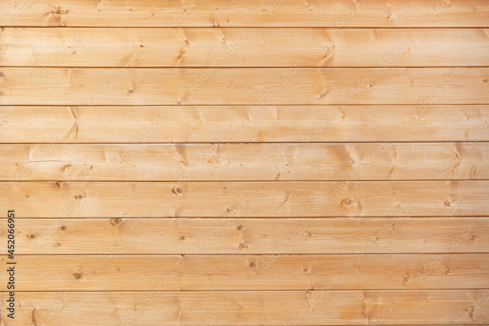 Striped Wooden boards are varnished. Retro aged panel decor. Textured background Striped Wooden boards are varnished. Retro aged panel decor. Textured background