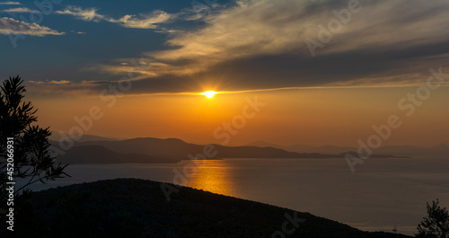 Fototapeta Naklejka Na Ścianę i Meble -  Beautiful sunset over Aegean Sea in Pelion Peninsula, Greece.
