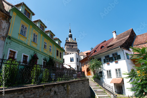 View of famous medieval fortified city and the Clock Tower, Sighisoara, Romania.