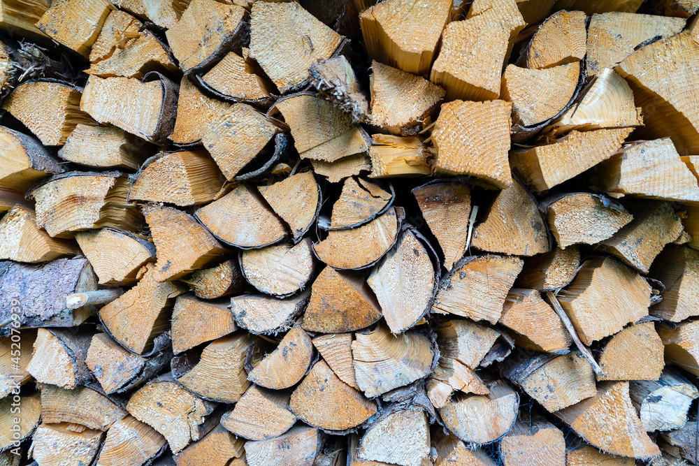 Piled of logs pine , waiting to be processed,lumber mill, made into lumber for construction or firewood. Piled of logs pine , waiting to be processed,lumber mill, made into lumber for construction or firewood.