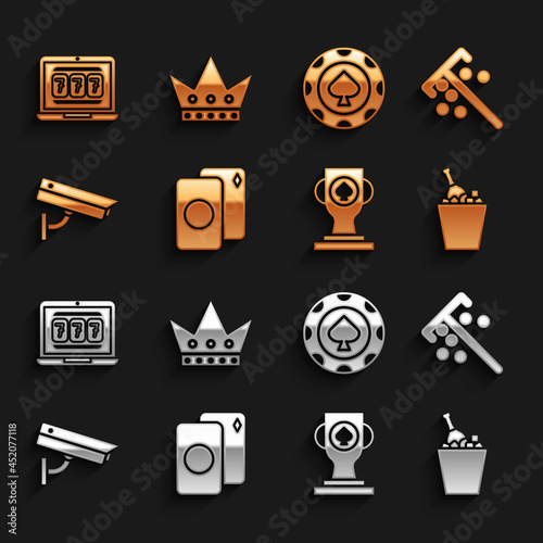 Set Deck of playing cards, Stick for chips, Champagne an ice bucket, Casino poker trophy cup, Security camera, Laptop and slot machine and King icon. Vector