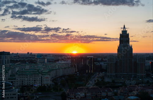 Nur-Sultan, Kazakhstan, July , 2021. City buildings of the capital against the backdrop of the sunset. High quality photo