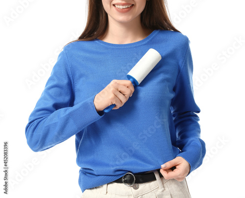 Young woman cleaning her sw...