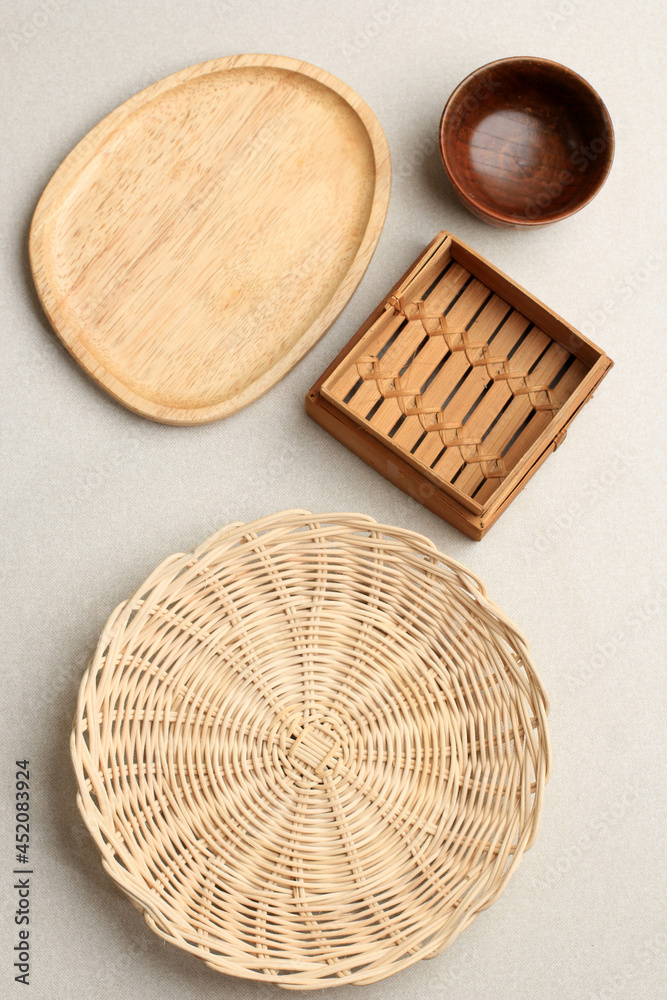 Rattan, Bamboo, and Wooden Dish. Concept of Go Green and Recycling Rattan, Bamboo, and Wooden Dish. Concept of Go Green and Recycling