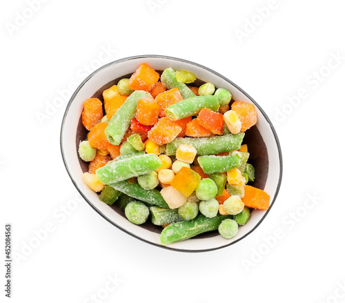 Bowl with mix of frozen vegetables on white background