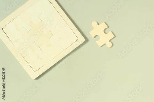 A flat lay image isolated assembled jigsaw puzzle concept idea best the choice key copy space on gray background.