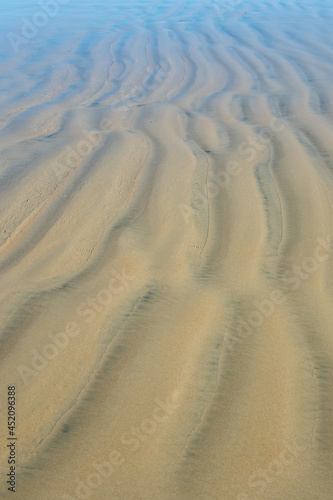 Sand texture., marks in the sand on the beach when the tide goes out