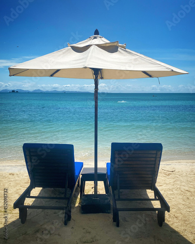 lounge chairs on the beach