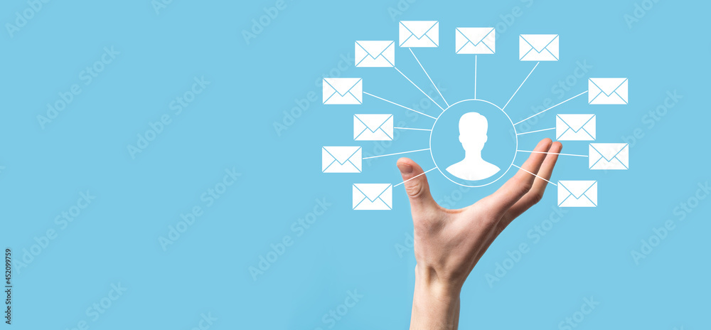 Male hand holding letter icon,email icons .Contact us by newsletter email and protect your personal information from spam mail. Customer service call center contact us.Email marketing and newsletter Male hand holding letter icon,email icons .Contact us by newsletter email and protect your personal information from spam mail. Customer service call center contact us.Email marketing and newsletter