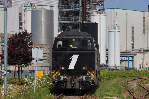 Vossloh locomotive from Rail Force One leaving shunting yard in the Port of Rotterdam photo