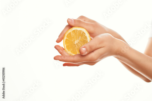 woman holding lemon healthy food vegetables fruits cooking
