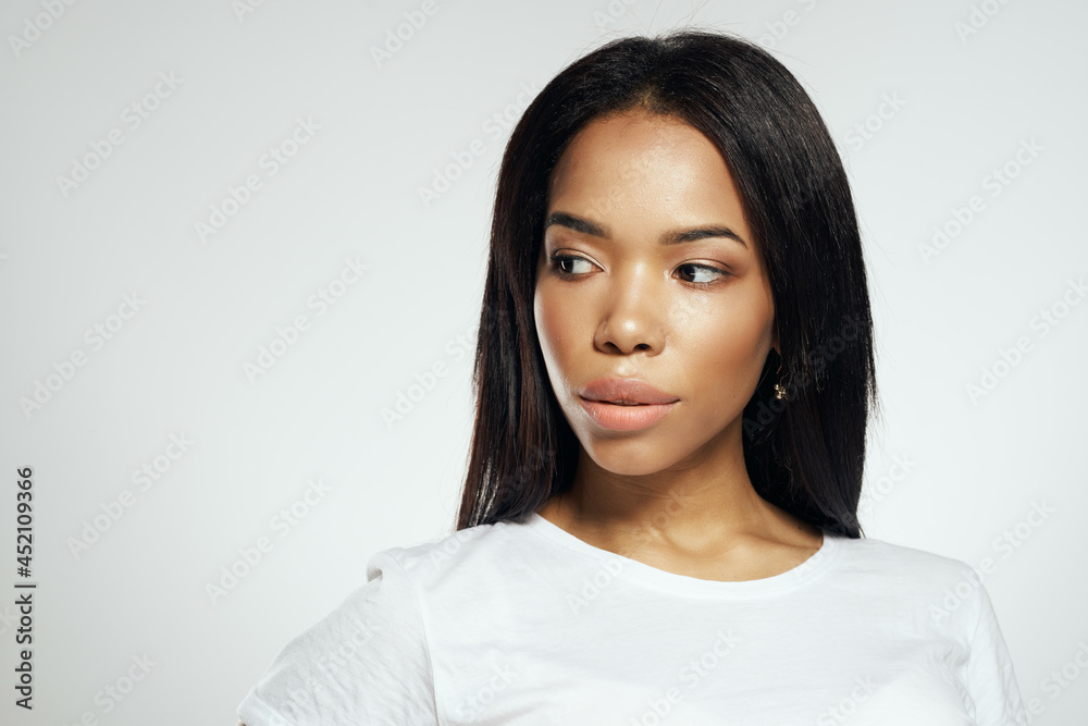 pretty brunette with long hair white tshirt home light background cosmetics pretty brunette with long hair white tshirt home light background cosmetics