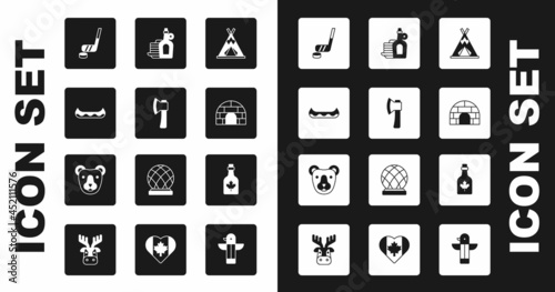Set Indian teepee or wigwam, Wooden axe, Kayak, Ice hockey stick and puck, Igloo ice house, Syrup with pancakes, Bottle of maple syrup and Bear head icon. Vector
