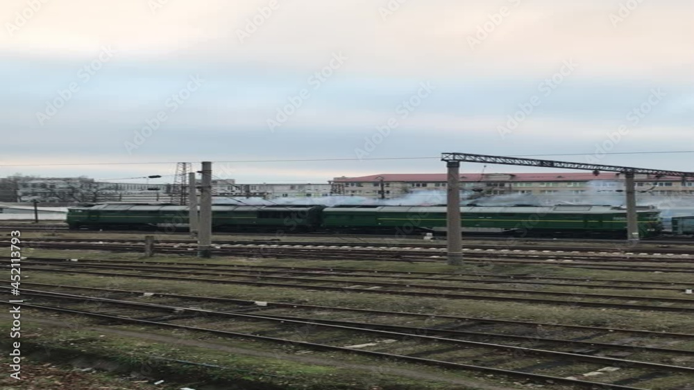 autumn landscape in the city freight train with smoke autumn landscape in the city freight train with smoke