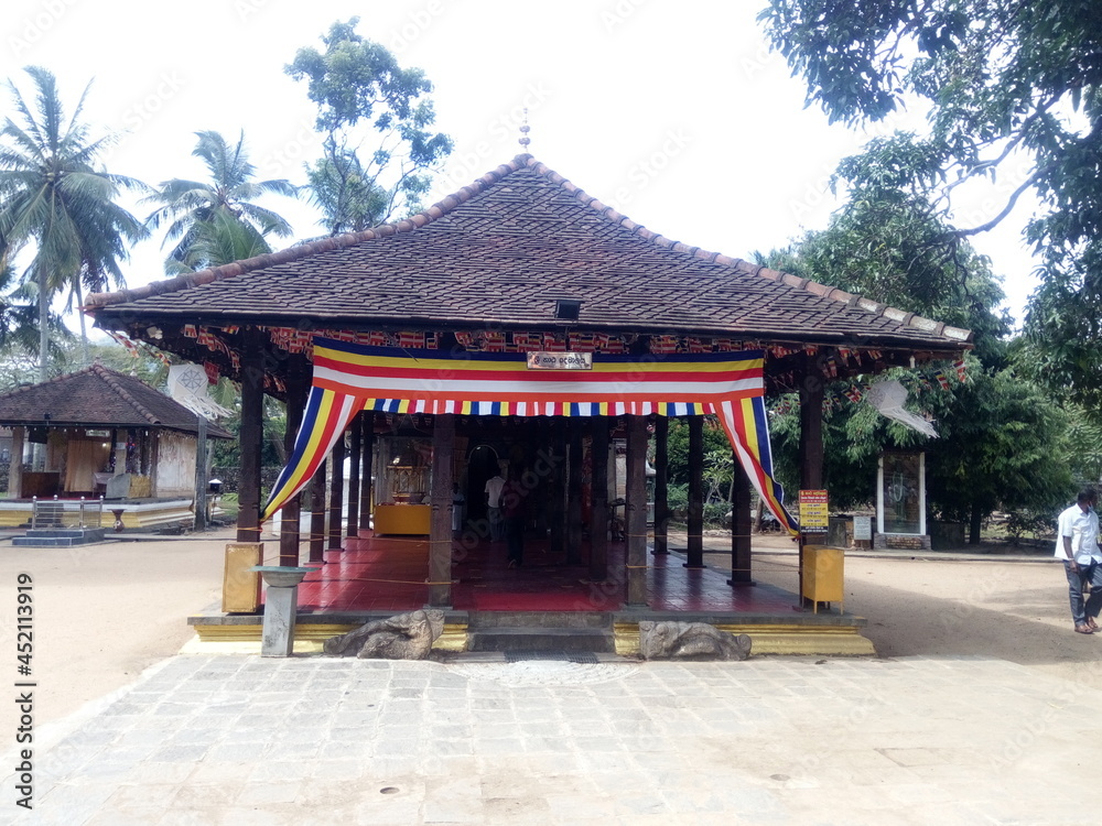 Photograph of the Natha Devalaya premises in front of the Temple of the Tooth in Kandy, Sri Lanka Photograph of the Natha Devalaya premises in front of the Temple of the Tooth in Kandy, Sri Lanka