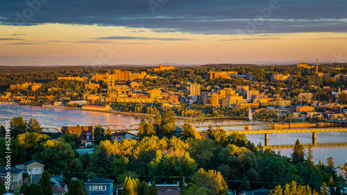 Wallpaper Mural Colorful sunset and cloudy sky over the city of Chicoutimi in Quebec (Canada) Torontodigital.ca