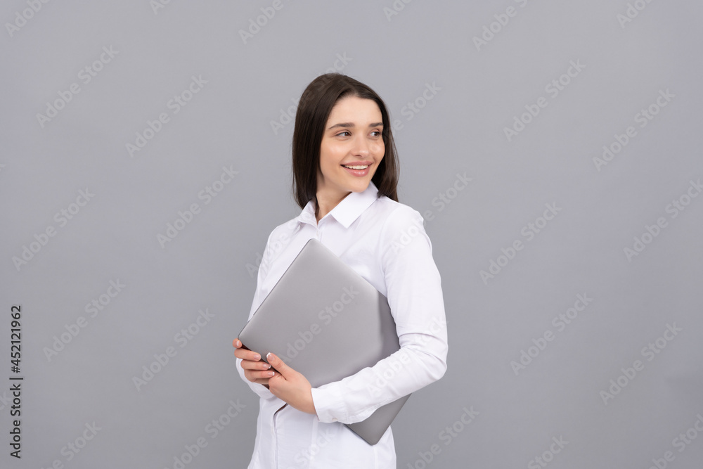 happy woman in white shirt hold computer, new technology