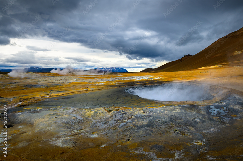 Steaming mud pool in the Hverir geothermal area in Iceland