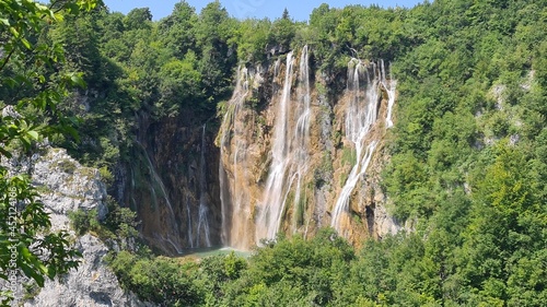 Beautiful waterfall in mountains in a national park in Croatia on a summer sunny day