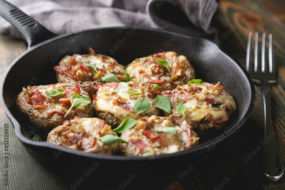 Baked mushrooms stuffed with cheese and bacon