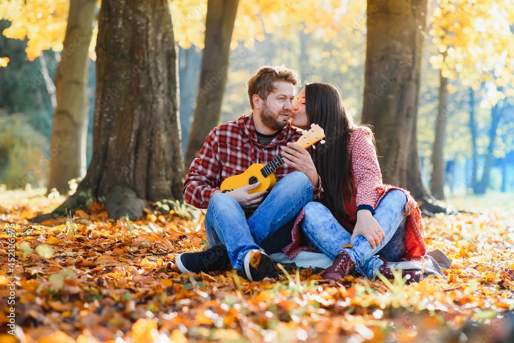 Couple in the autumn park Couple in the autumn park