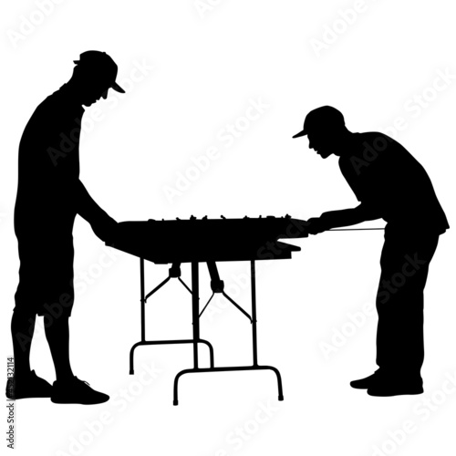 Silhouette two men playing table hockey on a white background
