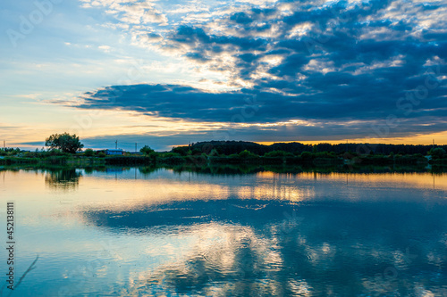 Beautiful calm lake with sunset