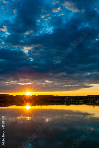 Beautiful calm lake with sunset